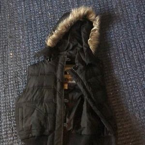 Black puffer vest with fur hood